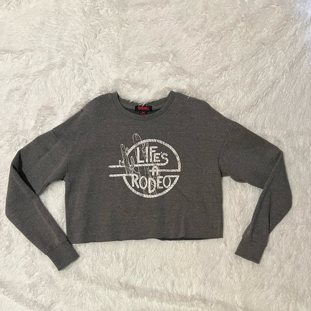 R&R Cowgirl Life’s A Rodeo Cropped Sweatshirt